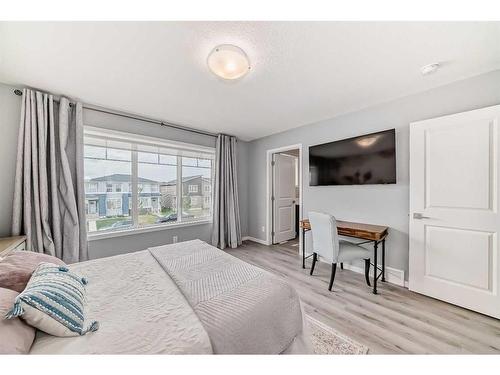 148 Dawson Drive, Chestermere, AB - Indoor Photo Showing Bedroom