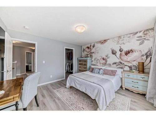 148 Dawson Drive, Chestermere, AB - Indoor Photo Showing Bedroom