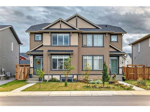 148 Dawson Drive, Chestermere, AB - Outdoor With Facade