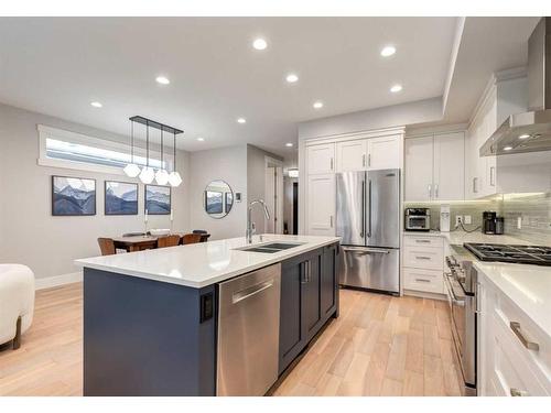 1937 47 Avenue Sw, Calgary, AB - Indoor Photo Showing Kitchen With Double Sink With Upgraded Kitchen