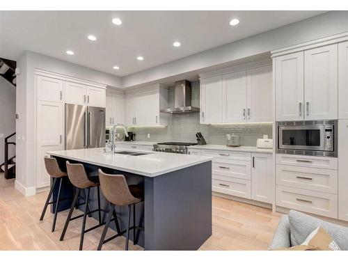 1937 47 Avenue Sw, Calgary, AB - Indoor Photo Showing Kitchen With Double Sink With Upgraded Kitchen