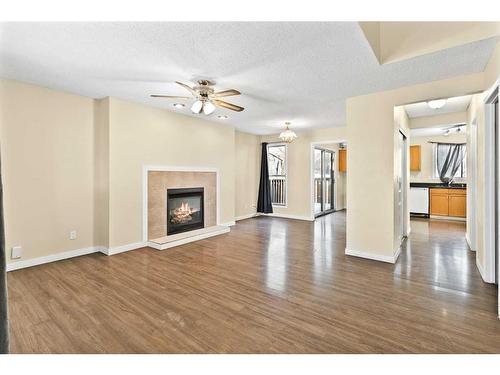 412 Templeside Circle Ne, Calgary, AB - Indoor Photo Showing Living Room With Fireplace