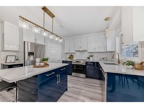 14333 Evergreen Street Sw, Calgary, AB - Indoor Photo Showing Kitchen With Stainless Steel Kitchen With Upgraded Kitchen