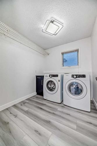 14333 Evergreen Street Sw, Calgary, AB - Indoor Photo Showing Laundry Room