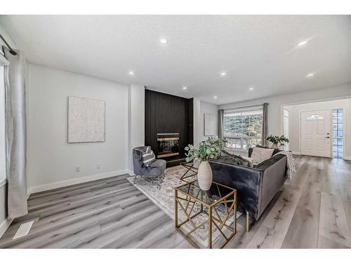 14333 Evergreen Street Sw, Calgary, AB - Indoor Photo Showing Living Room With Fireplace