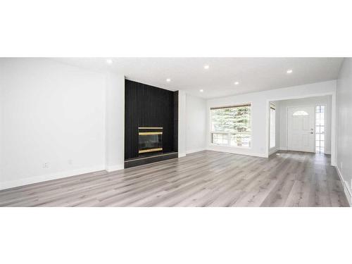 14333 Evergreen Street Sw, Calgary, AB - Indoor With Fireplace