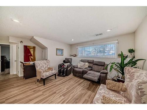 79 Castleglen Way Ne, Calgary, AB - Indoor Photo Showing Living Room