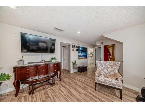 79 Castleglen Way Ne, Calgary, AB - Indoor Photo Showing Living Room