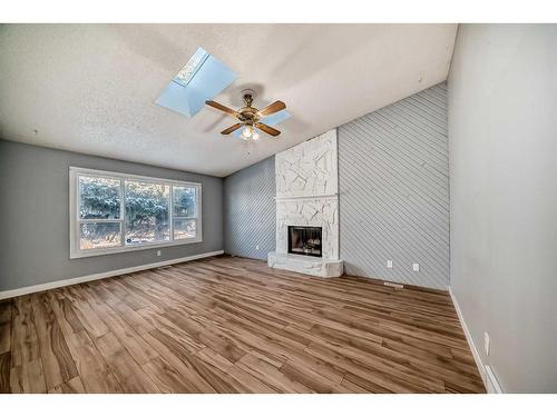 79 Castleglen Way Ne, Calgary, AB - Indoor With Fireplace