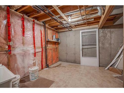 304 Queenston Heights Se, Calgary, AB - Indoor Photo Showing Basement