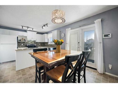 97 Covepark Close Ne, Calgary, AB - Indoor Photo Showing Dining Room