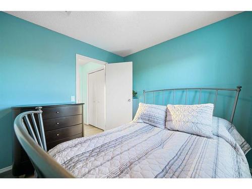 97 Covepark Close Ne, Calgary, AB - Indoor Photo Showing Bedroom