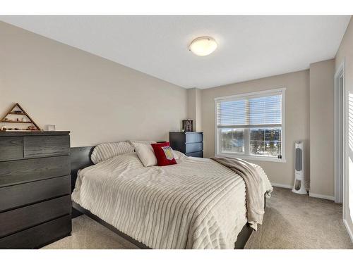 100 Legacy Main Street Se, Calgary, AB - Indoor Photo Showing Bedroom