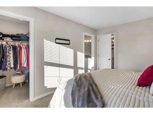 100 Legacy Main Street Se, Calgary, AB - Indoor Photo Showing Bedroom