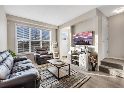 100 Legacy Main Street Se, Calgary, AB - Indoor Photo Showing Living Room