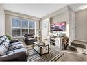 100 Legacy Main Street Se, Calgary, AB  - Indoor Photo Showing Living Room 