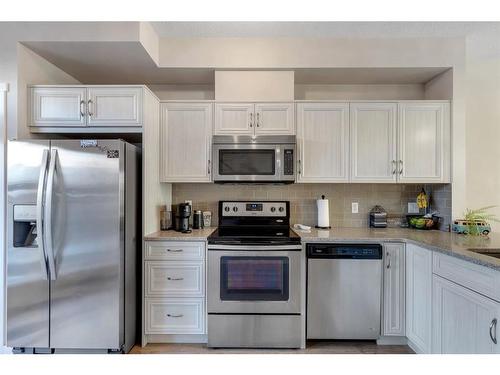 100 Legacy Main Street Se, Calgary, AB - Indoor Photo Showing Kitchen