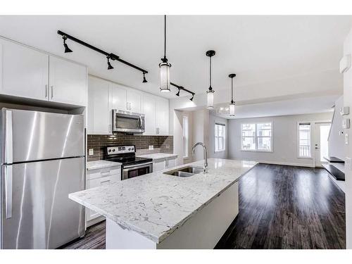 49 Evanscrest Court Nw, Calgary, AB - Indoor Photo Showing Kitchen With Stainless Steel Kitchen With Upgraded Kitchen