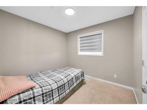 250 Martinwood Place Ne, Calgary, AB - Indoor Photo Showing Bedroom