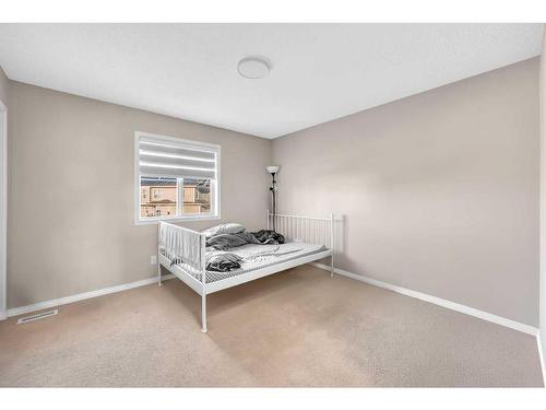 250 Martinwood Place Ne, Calgary, AB - Indoor Photo Showing Bedroom