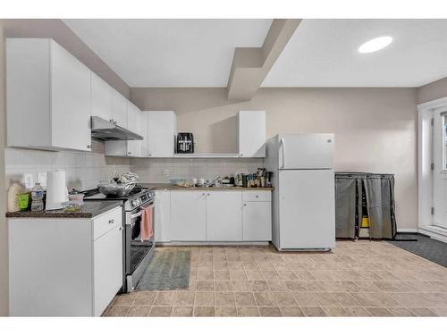 250 Martinwood Place Ne, Calgary, AB - Indoor Photo Showing Kitchen With Double Sink