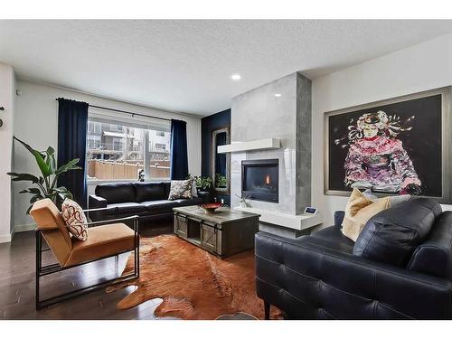 435 Nolan Hill Drive Nw, Calgary, AB - Indoor Photo Showing Living Room With Fireplace