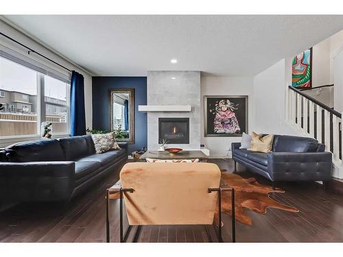 435 Nolan Hill Drive Nw, Calgary, AB - Indoor Photo Showing Living Room With Fireplace