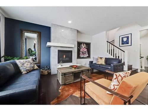 435 Nolan Hill Drive Nw, Calgary, AB - Indoor Photo Showing Living Room With Fireplace