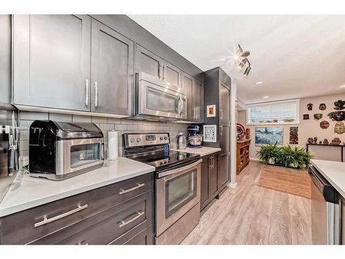 501 Cranford Mews Se, Calgary, AB - Indoor Photo Showing Kitchen With Upgraded Kitchen