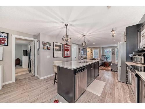 501 Cranford Mews Se, Calgary, AB - Indoor Photo Showing Kitchen With Upgraded Kitchen