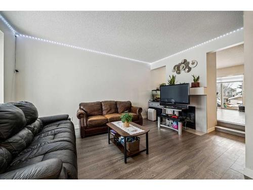 54 Shawbrooke Court Sw, Calgary, AB - Indoor Photo Showing Living Room