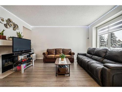 54 Shawbrooke Court Sw, Calgary, AB - Indoor Photo Showing Living Room