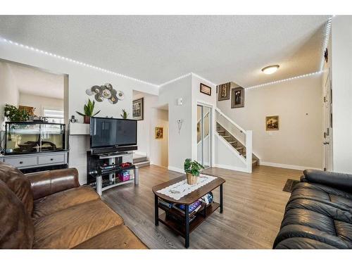 54 Shawbrooke Court Sw, Calgary, AB - Indoor Photo Showing Living Room