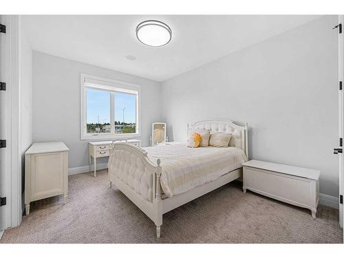 102 Malibou Road Sw, Calgary, AB - Indoor Photo Showing Bedroom