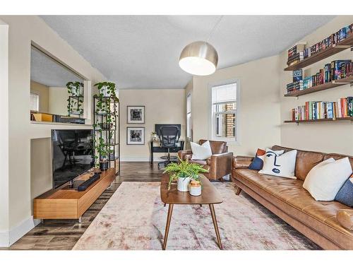 314-2204 1 Street Sw, Calgary, AB - Indoor Photo Showing Living Room With Fireplace