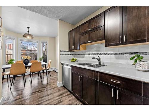 314-2204 1 Street Sw, Calgary, AB - Indoor Photo Showing Kitchen With Double Sink