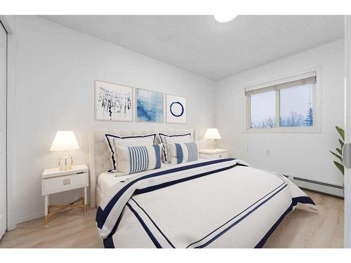 212-5000 Somervale Court Sw, Calgary, AB - Indoor Photo Showing Bedroom