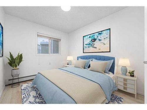 212-5000 Somervale Court Sw, Calgary, AB - Indoor Photo Showing Bedroom