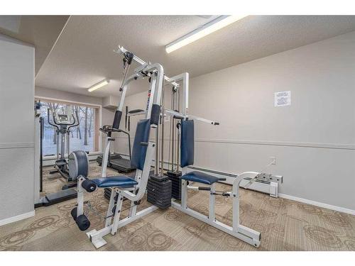 212-5000 Somervale Court Sw, Calgary, AB - Indoor Photo Showing Gym Room