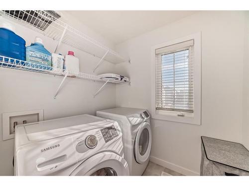 203 Carrington Circle Nw, Calgary, AB - Indoor Photo Showing Laundry Room