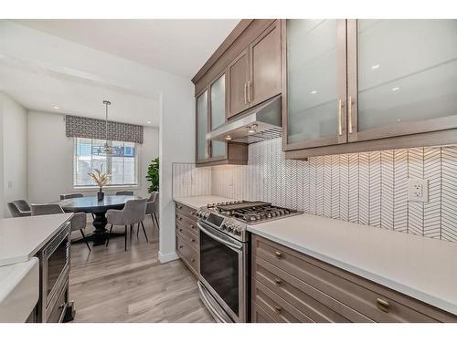 203 Carrington Circle Nw, Calgary, AB - Indoor Photo Showing Kitchen With Upgraded Kitchen