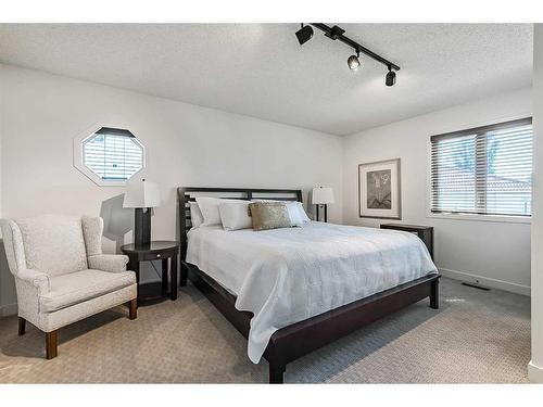 133 Candle Place Sw, Calgary, AB - Indoor Photo Showing Bedroom