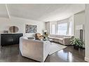 133 Candle Place Sw, Calgary, AB  - Indoor Photo Showing Living Room 