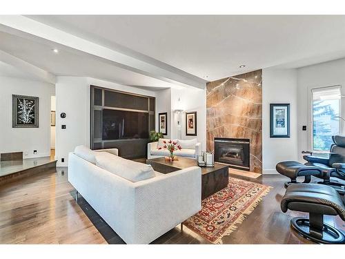 133 Candle Place Sw, Calgary, AB - Indoor Photo Showing Living Room With Fireplace