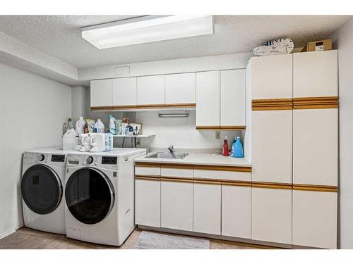 405 Cannington Close Sw, Calgary, AB - Indoor Photo Showing Laundry Room