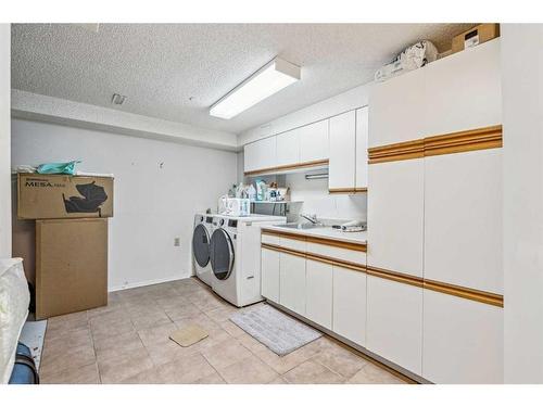 405 Cannington Close Sw, Calgary, AB - Indoor Photo Showing Laundry Room