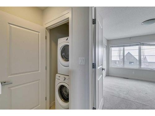 526 Walden Circle Se, Calgary, AB - Indoor Photo Showing Laundry Room