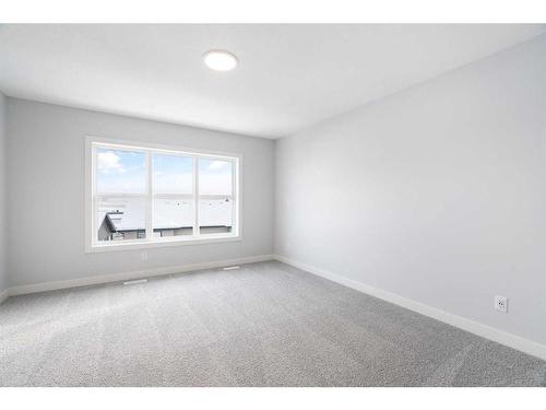 200 Precedence Hill, Cochrane, AB - Indoor Photo Showing Other Room