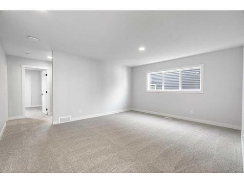 200 Precedence Hill, Cochrane, AB - Indoor Photo Showing Other Room