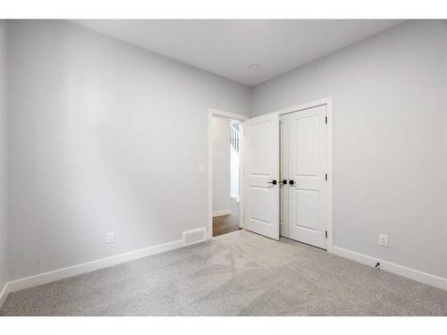 200 Precedence Hill, Cochrane, AB - Indoor Photo Showing Other Room